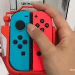 A man is having new Nintendo Switch Controller in his hand