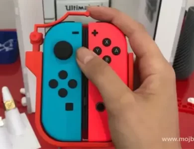 A man is having new Nintendo Switch Controller in his hand