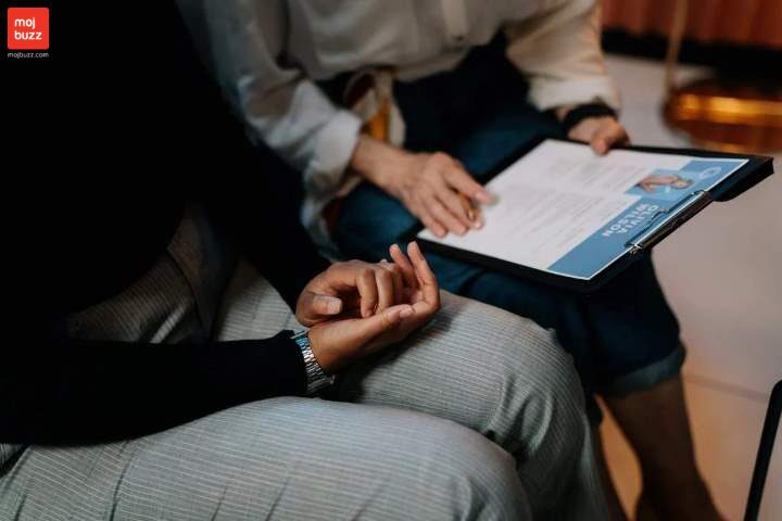 Recruiter holding resume in her hand