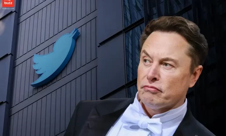 Elon Musk looking at Twitter photoshopped image