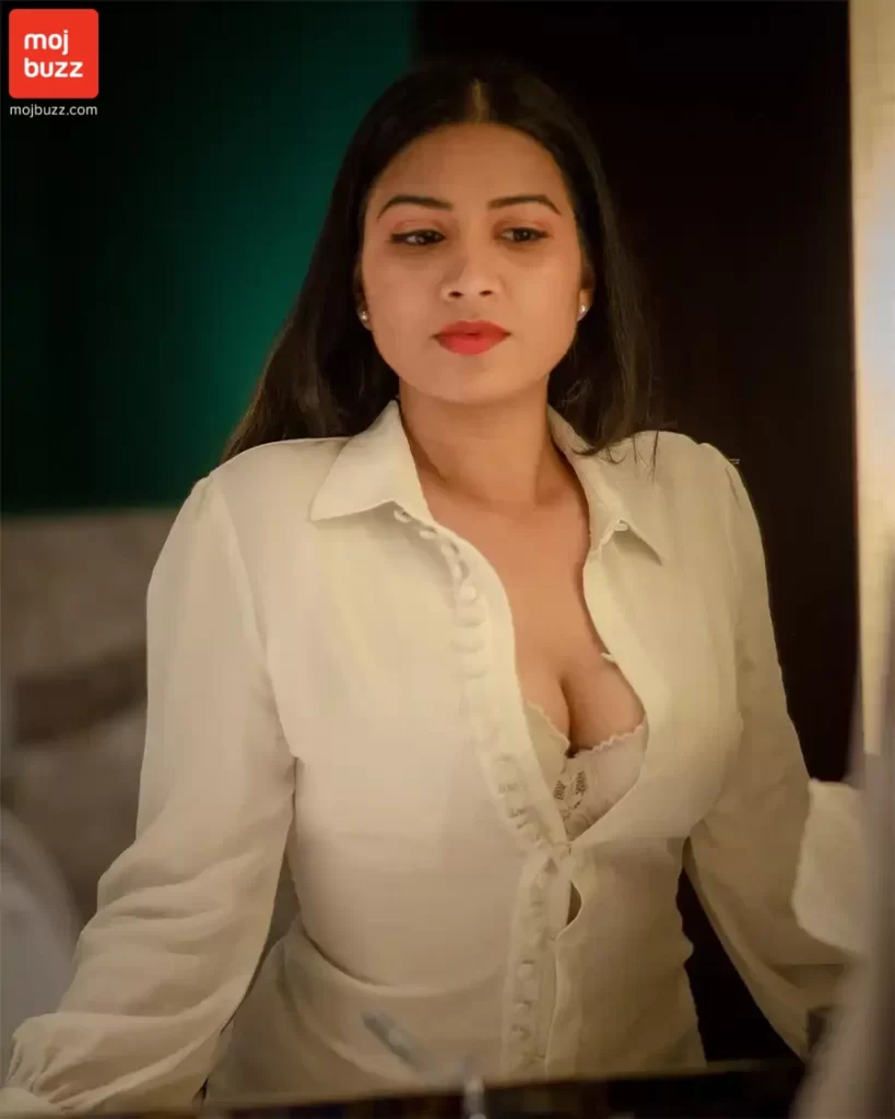 A woman (Inaya Sultana) wearing a hot white shirt