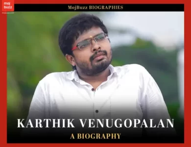 A man in white shirt standing on the roof giving pose for a photoshoot. Karthik Venugopalan biography