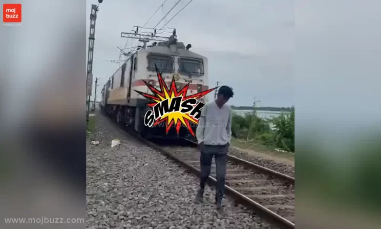 A boy walking in front of high speed train