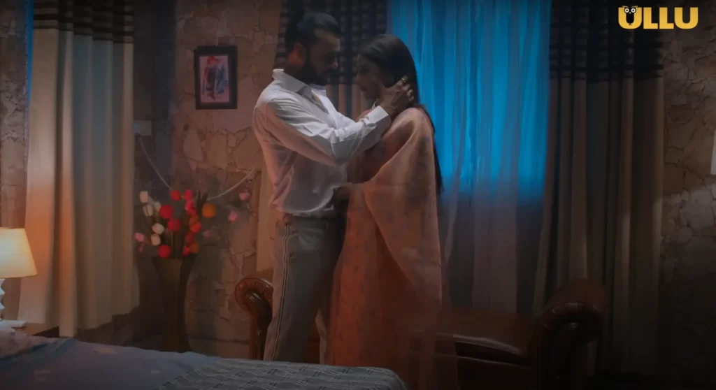 a man about to kiss a woman in bedroom