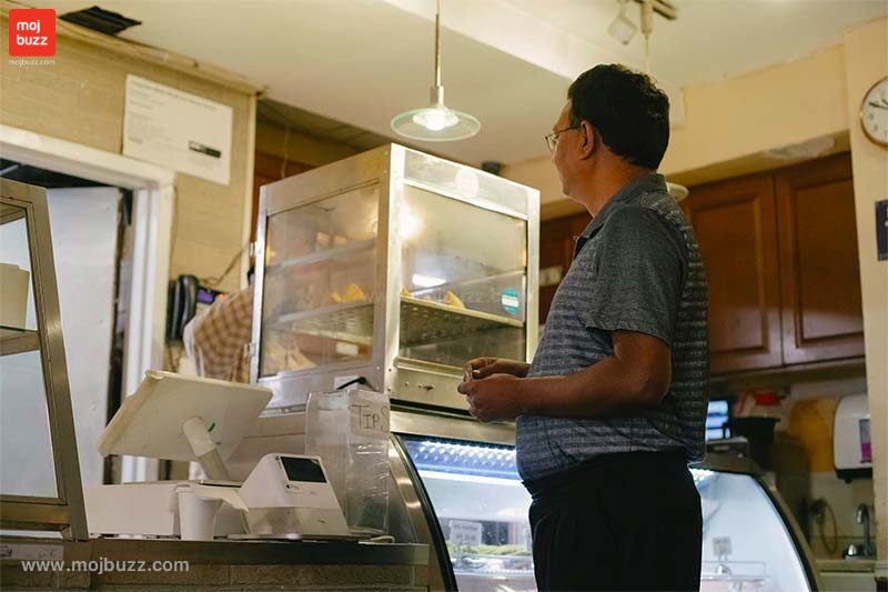 A man purchasing something from the store