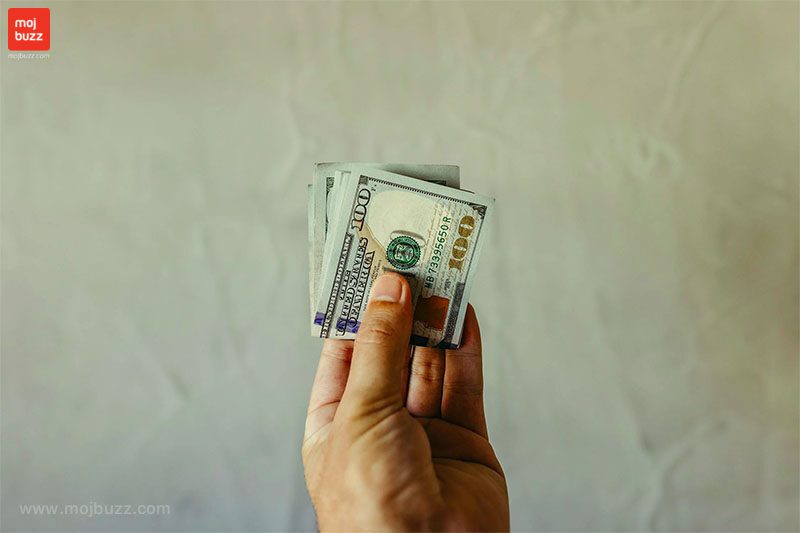 holding some money in someone's hand 10 Stupid things